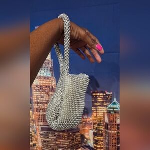 Crystal-Embellished Silver Wristlet Bag